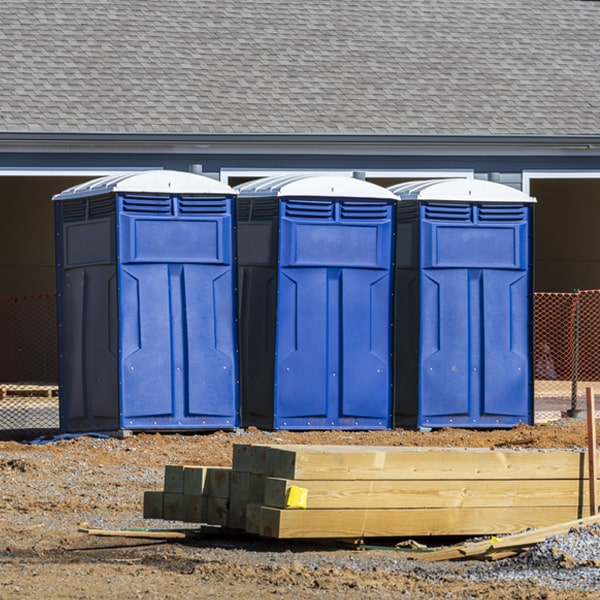 what is the cost difference between standard and deluxe portable toilet rentals in Roark KY